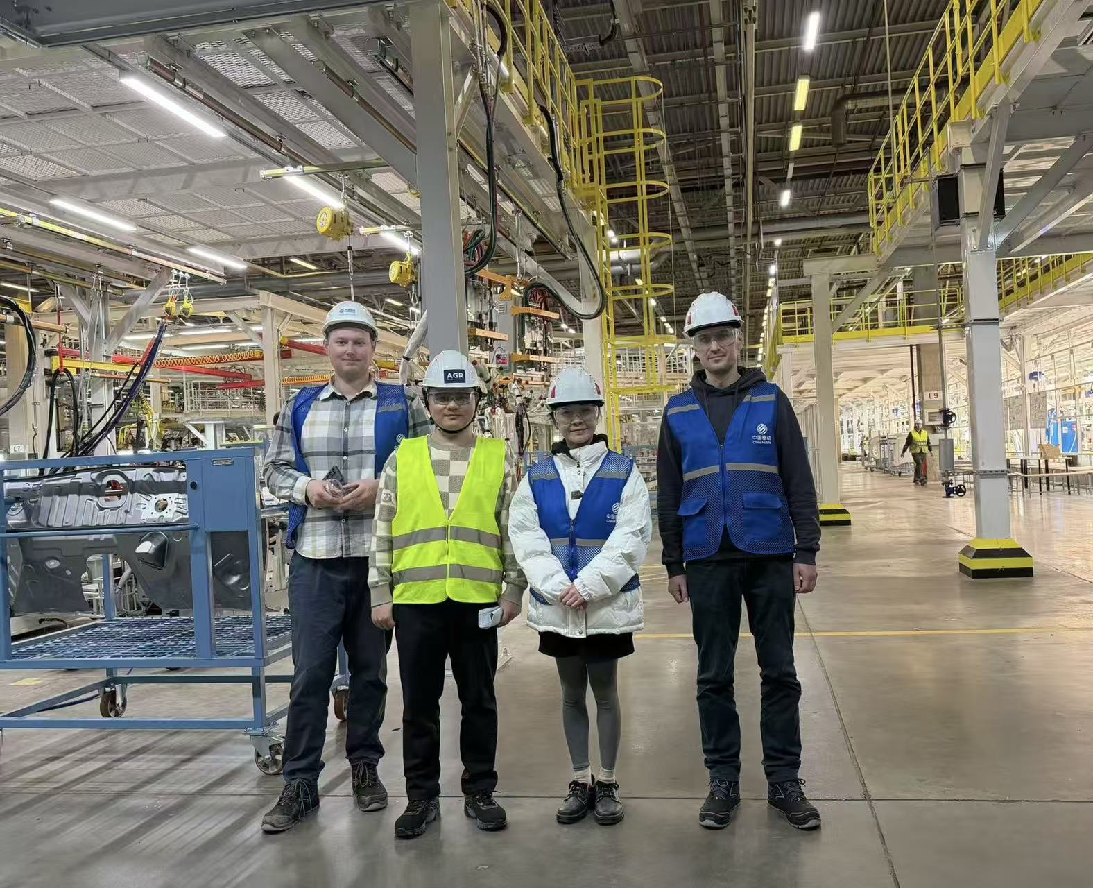 Project team at the automotive manufacturing plant